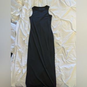 Black dress with slit.